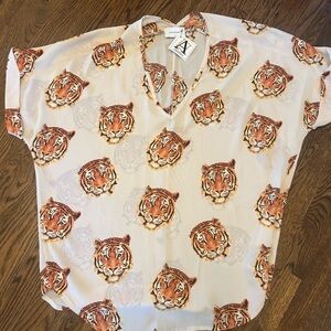 Adrienne Cream Tiger Print Top. Never worn. Perfect for game days!